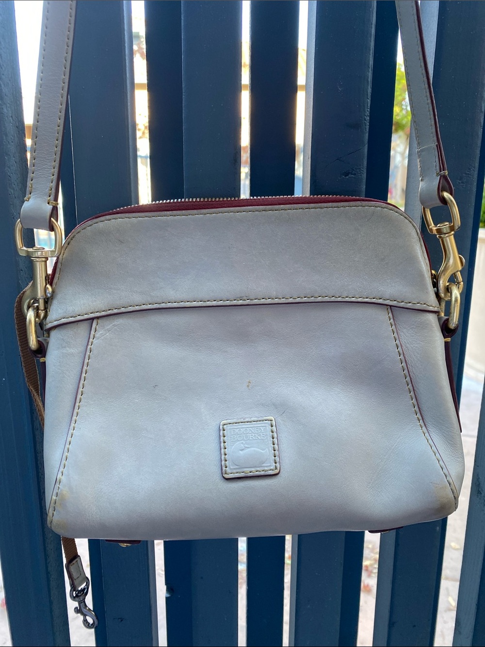 Dooney & Bourke Light Gray Leather Crossbody with Gold Hardware